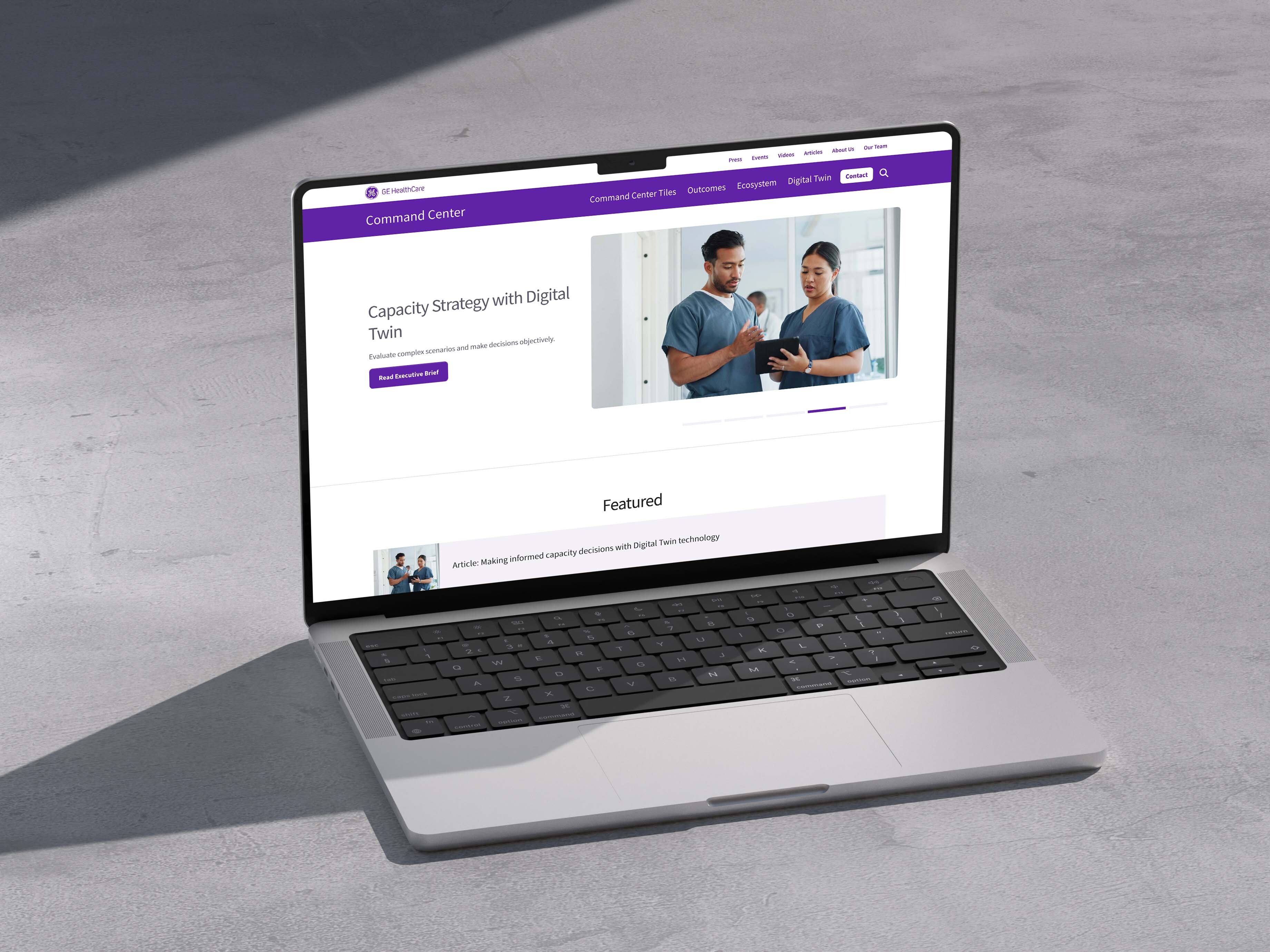 A laptop with the GE HealthCare Command Center homepage