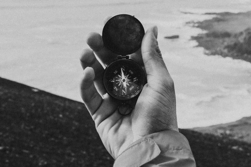 Hand with compass